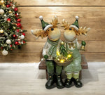 LED Deko Rentier sitzend auf der Bank 3 warm weisse LED