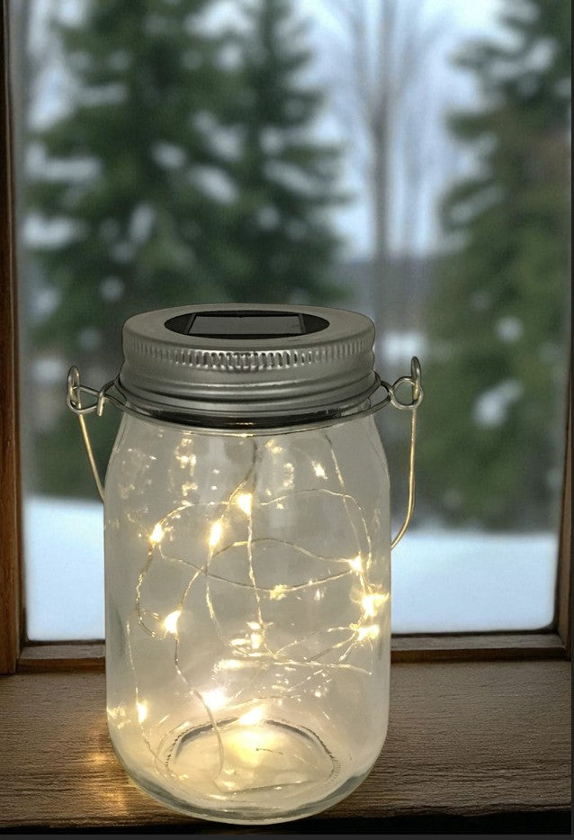 LED Solar Windlicht Klar 
mit Microlight 10LED
Grösse: D:8cm H:14cm