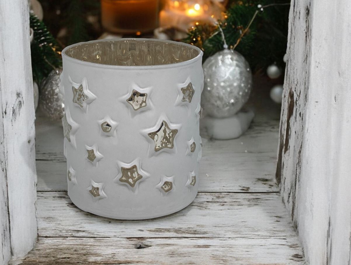 Windlicht aus Glas 
weiss mit Sternenmotiv H10cm
