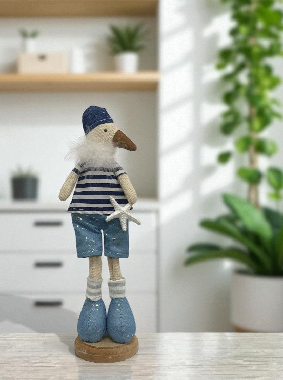 Deko Möwe aus Stoff stehend H:32cm
Design: Beach
Farbe: Blau
L:10cm B:8.5cm H:32cm