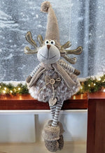 Deko Elch Kantenhocker braun weiss mit Schal und Mütze