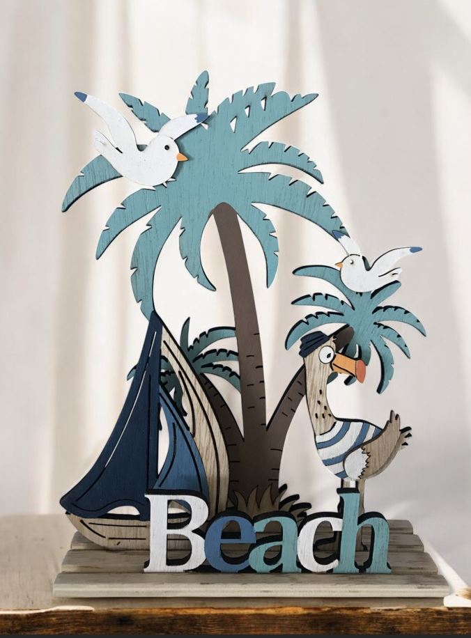Deko Maritim Beach aus Holz
mit Segelboot
Farbe: Weiss/Blau
L:16.5cm B:5cm H:23cm