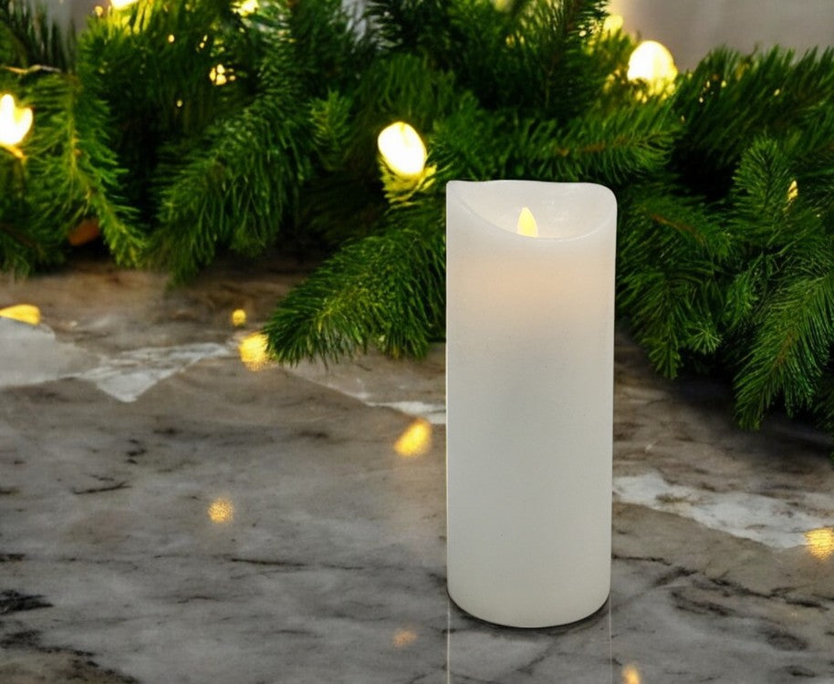 Bougie en cire LED blanche rustique avec flamme mobile
 P:9cm - H:23cm