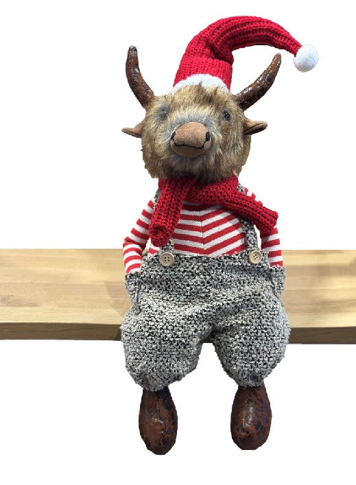 Deko Hochlandrind sitzend mit Santa Mütze 20x23x75cm