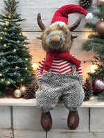 Deko Hochlandrind sitzend mit Santa Mütze 20x23x75cm
