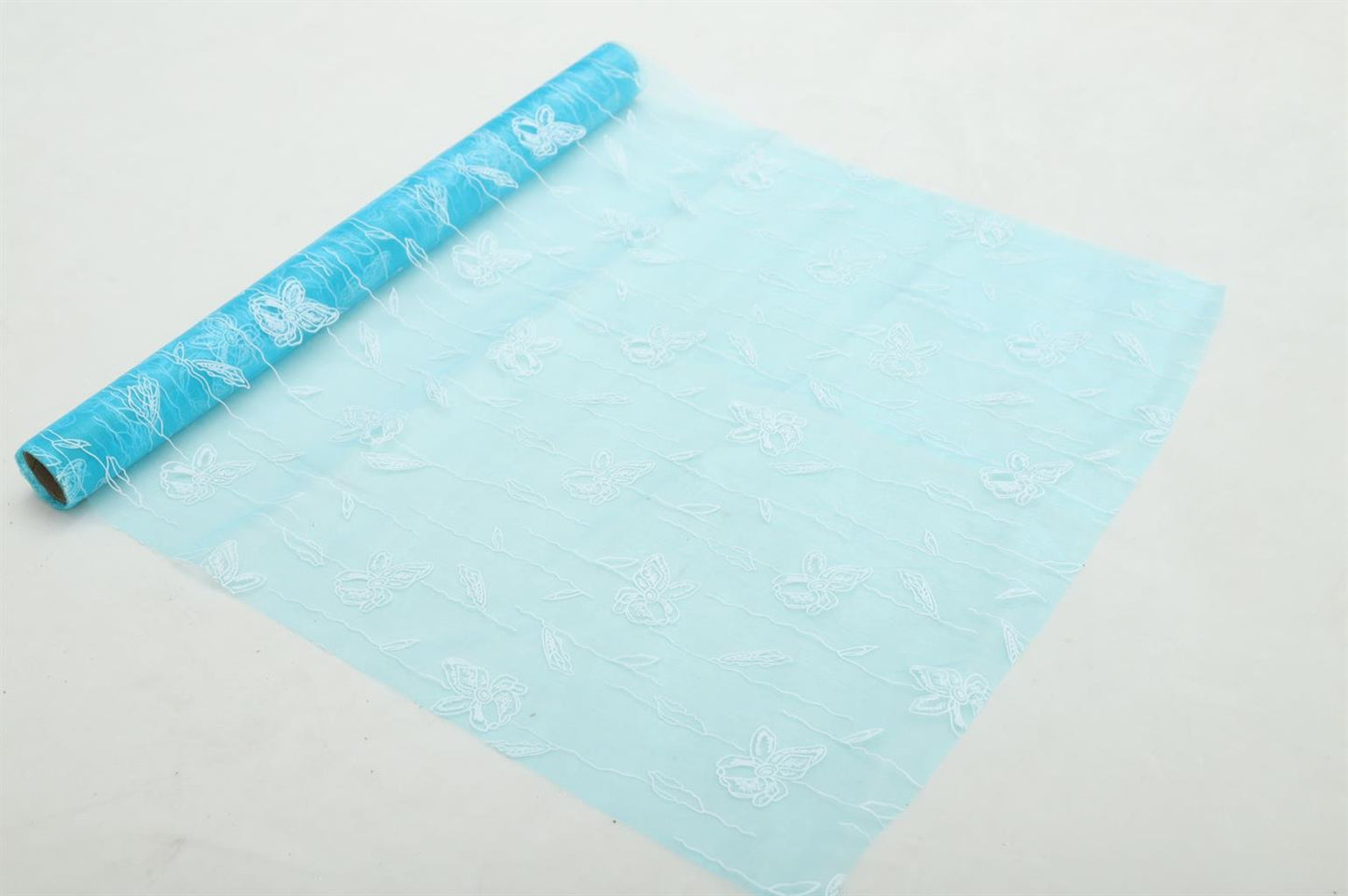 Dekostoff "Organza" gerolltund geschnitten blau Schmetterlingsdruck
Grösse: 36cm x 300cm