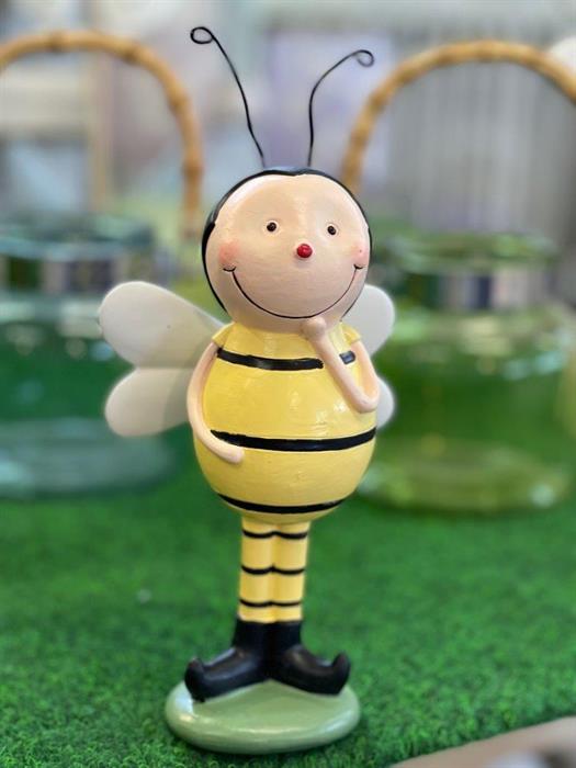 Deko Biene aus Polyresin 
Farbe: Gelb 
L:9.5cm B:5.5cm H:21cm