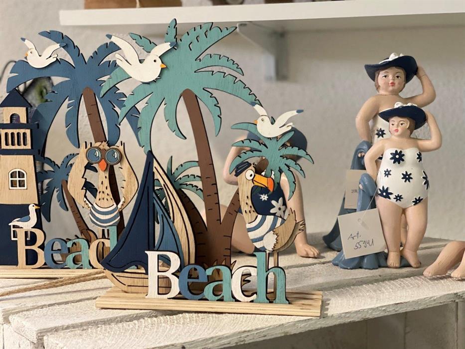 Deko Maritim Beach aus Holz
mit Segelboot
Farbe: Weiss/Blau
L:16.5cm B:5cm H:23cm