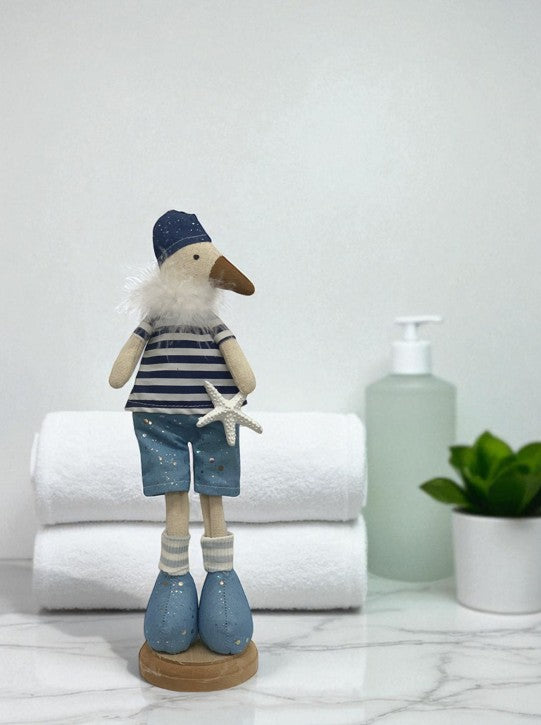 Deko Möwe aus Stoff stehend H:32cm
Design: Beach
Farbe: Blau
L:10cm B:8.5cm H:32cm