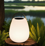 LED Solar Leuchte mit Henkel 
Rotationslampe mit Fernbedienung
Grösse: 20x20x28cm