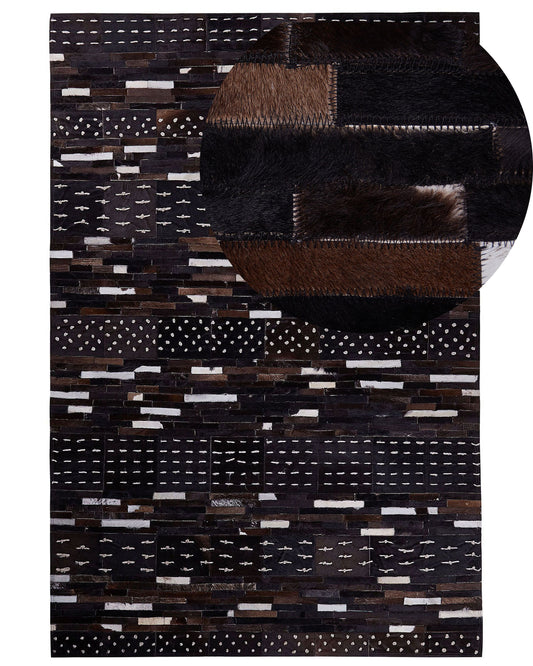 Teppich Kuhfell dunkelbraun 160 x 230 cm geometrisches Muster Kurzflor AKSEKI