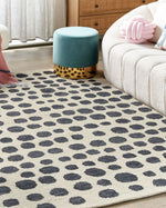 Teppich beige / schwarz 200 x 200 cm gepunktetes Muster HAVRAN