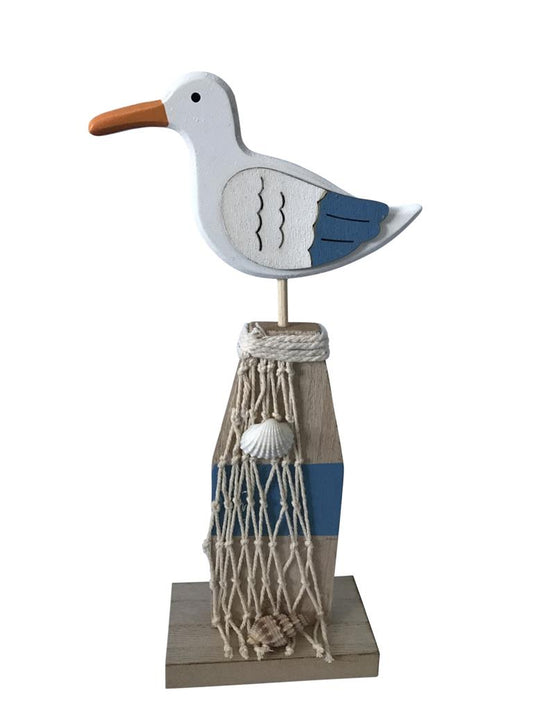 Deko Möwe auf Sockel aus Holz H:24cm
mit Netz und Muscheln
Farbe: Weiss/Blau