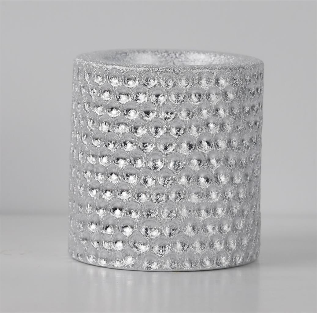 Teelichthalter aus Keramik
Design: gehämmertes Silber
D:7cm x H:7cm