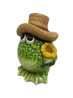 Deko Frosch 
mit Hut und Blume 
16 x16.5 x23.2cm