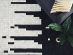 Teppich Leder schwarz / beige 80 x 150 cm Kurzflor BOLU