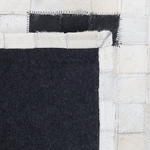 Teppich Leder schwarz / beige 160 x 230 cm Kurzflor BOLU