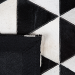 Teppich Kuhfell schwarz-weiss 160 x 230 cm geometrisches Muster Kurzflor ODEMIS