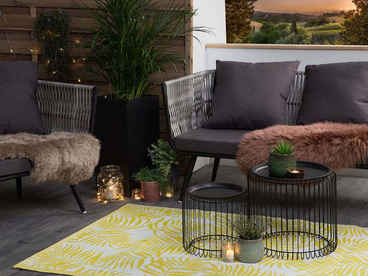 Outdoor Teppich gelb 120 x 180 cm Palmenmuster zweiseitig Kurzflor KOTA