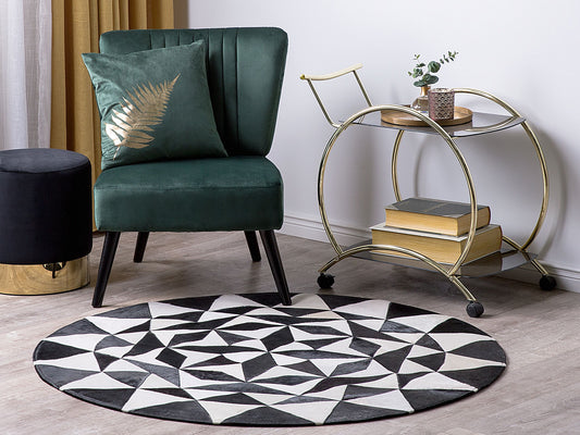 Teppich Kuhfell schwarz / weiss ⌀ 140 cm geometrisches Muster TURGUTLU