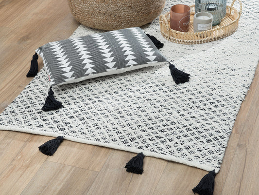 Teppich Wolle schwarz / weiss 80 x 150 cm Kurzflor GEMLIK