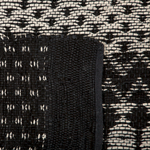 Teppich Leder schwarz / beige 140 x 200 cm abstraktes Muster Kurzflor SOKUN