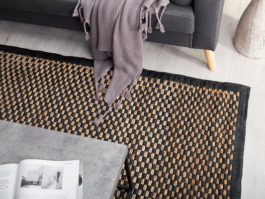 Teppich Leder schwarz / beige 140 x 200 cm kariertes Muster Kurzflor GERCE II