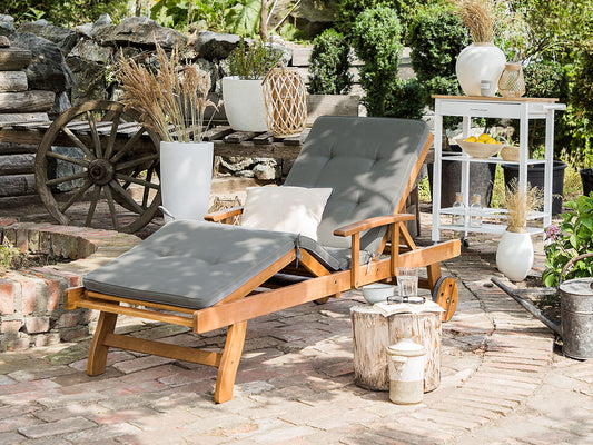 Gartenliege Akazienholz hellbraun Auflage graphitgrau rollbar JAVA