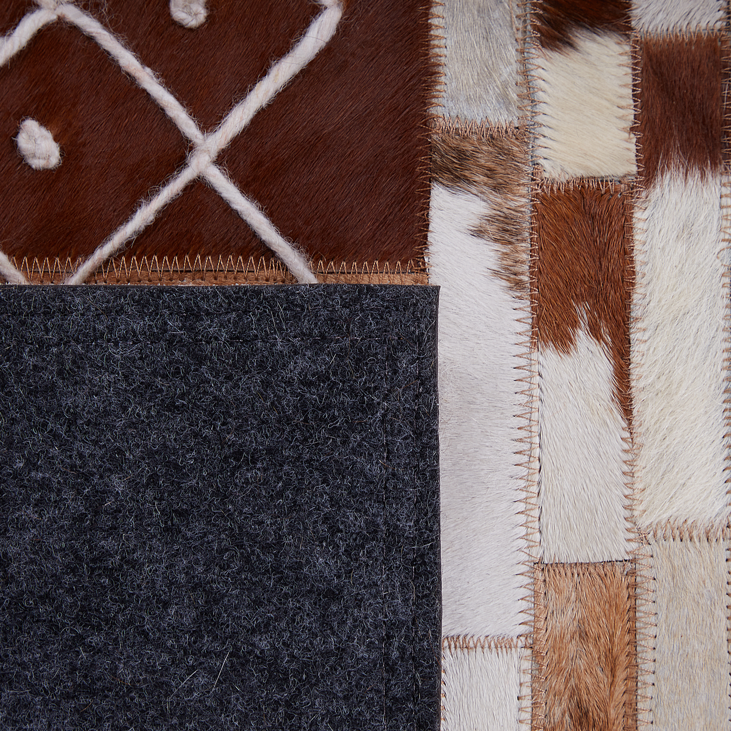 Teppich Kuhfell braun 140 x 200 cm Patchwork Kurzflor HEREKLI