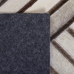 Teppich Kuhfell beige-grau 140 x 200 cm geometrisches Muster Kurzflor TEKIR