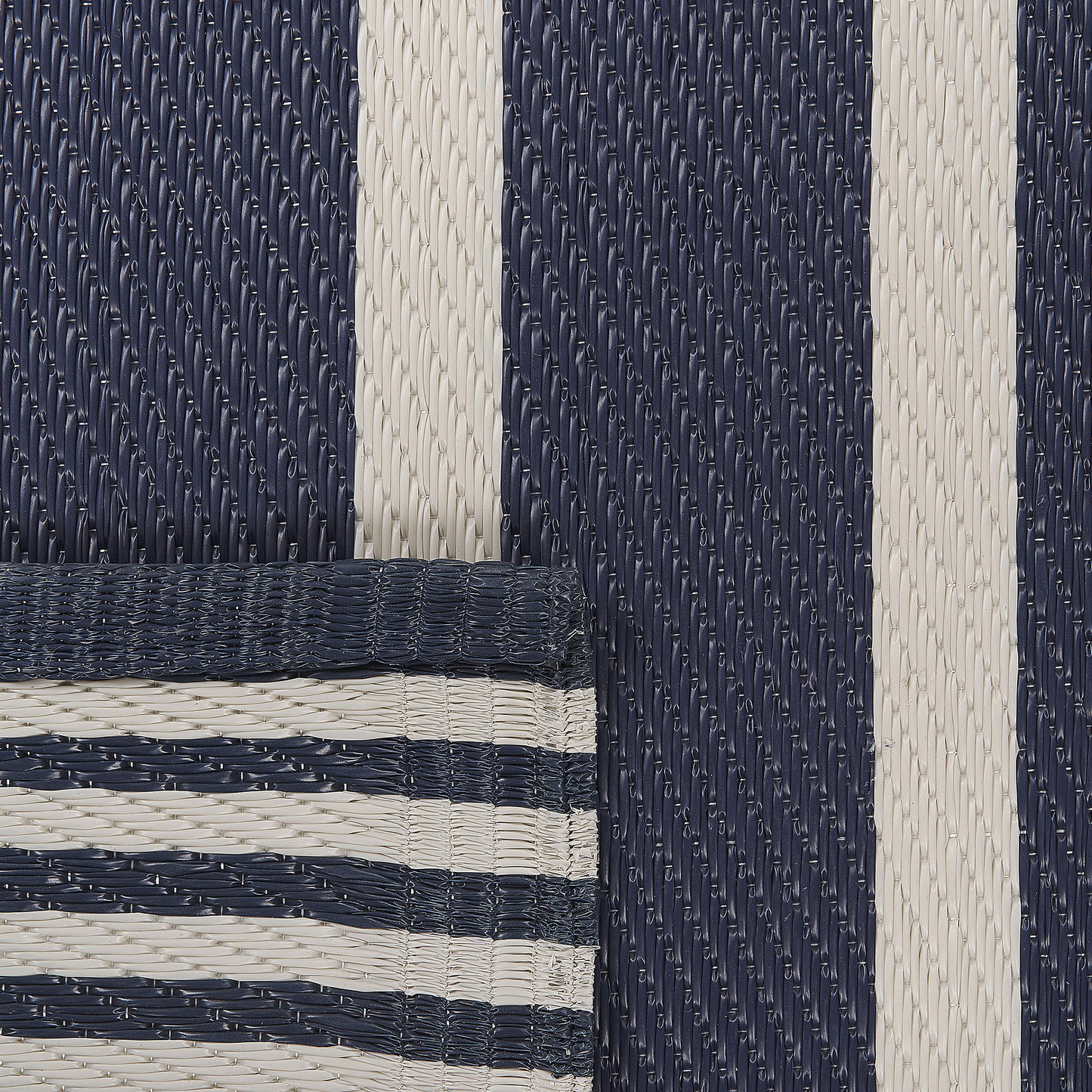 Outdoor Teppich dunkelblau 120 x 180 cm Streifenmuster Kurzflor HALDIA