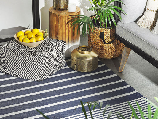 Outdoor Teppich dunkelblau 120 x 180 cm Streifenmuster Kurzflor HALDIA