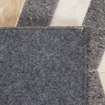 Teppich Kuhfell grau / beige 140 x 200 cm Patchwork Kurzflor BAGGOZE
