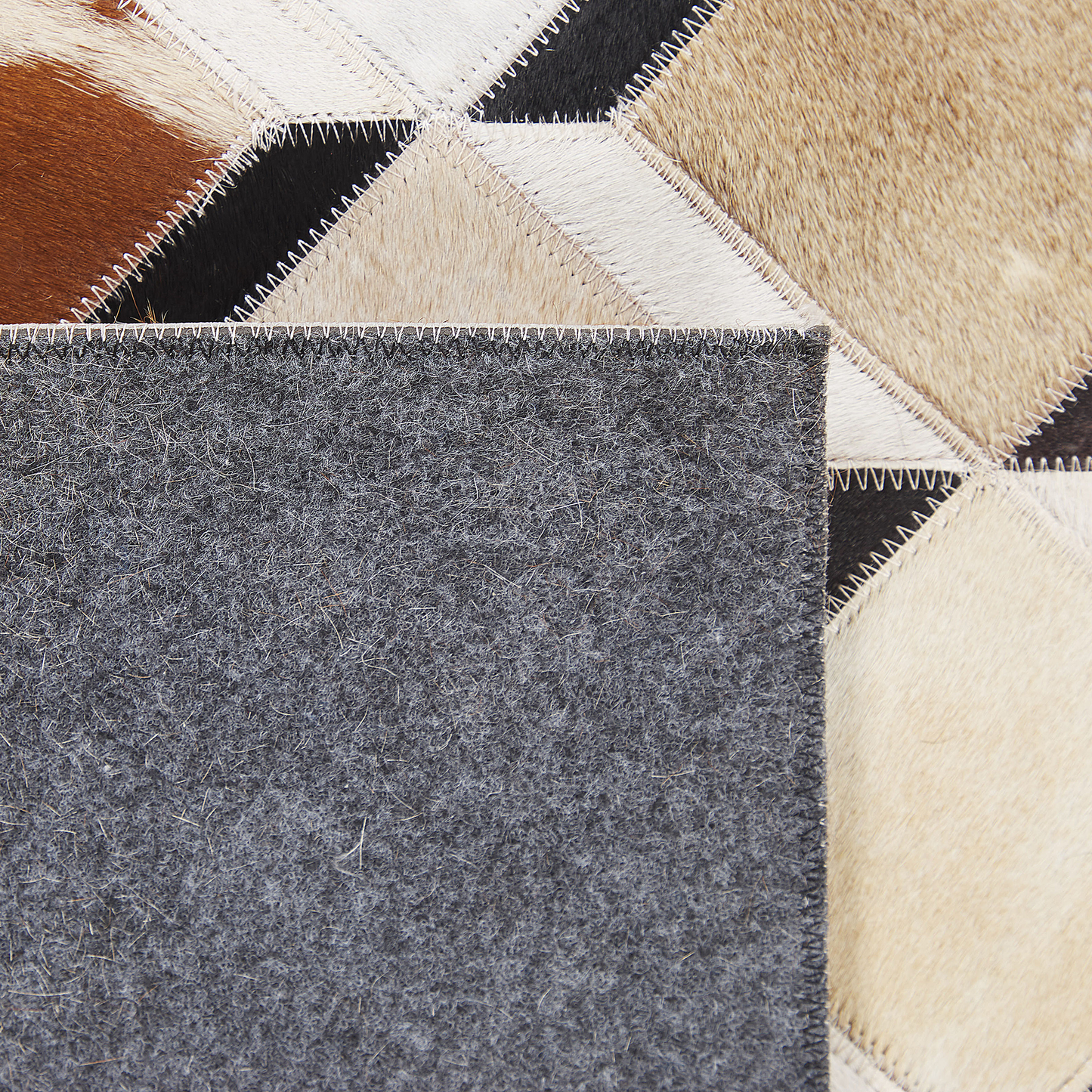 Teppich Kuhfell braun 140 x 200 cm Patchwork Kurzflor SERINOVA