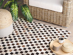 Teppich Kuhfell beige / braun 140 x 200 cm Patchwork Kurzflor KAYABEY