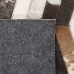 Teppich Kuhfell braun / weiss 140 x 200 cm Patchwork Kurzflor AKYELE