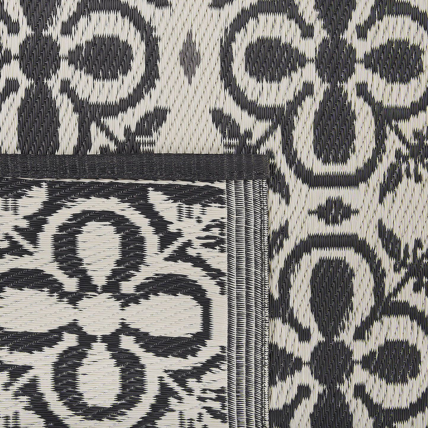 Outdoor Teppich schwarz / weiss 120 x 180 cm geometrisches Muster Kurzflor NELLUR