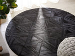 Teppich Kuhfell schwarz ⌀ 140 cm geometrisches Muster Kurzflor KASAR