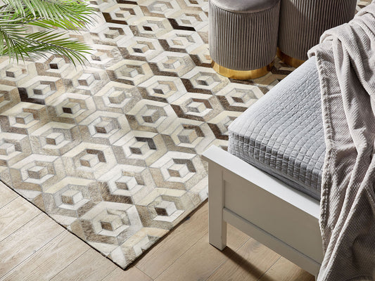 Teppich Kuhfell beige / braun 160 x 230 cm geometrisches Muster Kurzflor TAVAK