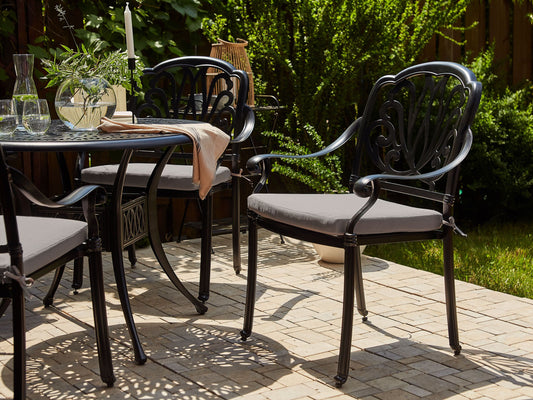 Set mit 4 Stühlen und Sitzkissen ANCONA Metall Schwarz