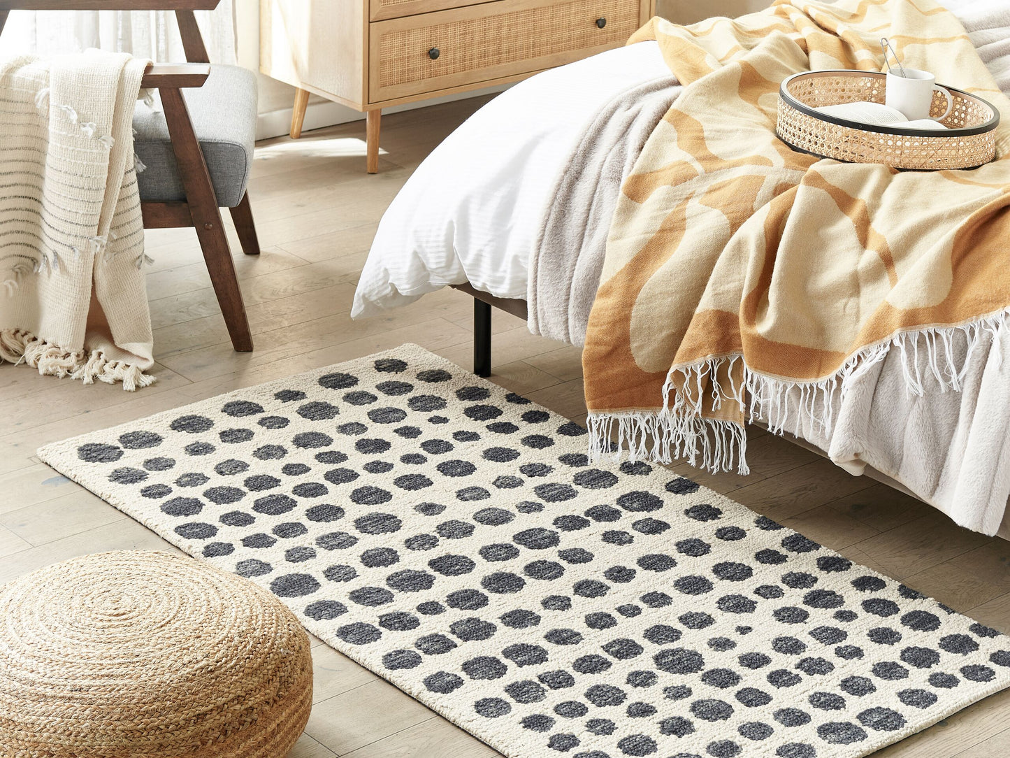 Teppich beige / schwarz 80 x 150 cm gepunktetes Muster HAVRAN