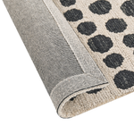 Teppich beige / schwarz 80 x 150 cm gepunktetes Muster HAVRAN