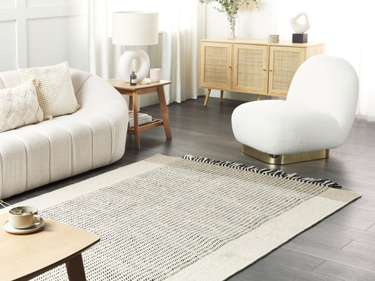 Teppich Wolle beige / schwarz 160 x 230 cm Kurzflor DIVARLI