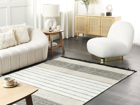 Teppich Wolle beige / schwarz 140 x 200 cm Kurzflor YAZLIK